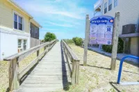 Luxury 4 bedroom townhome with ocean view steps away from the beach!