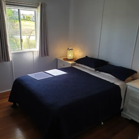 Indoor/outdoor pet-friendly beach house next to world-class beach and river.