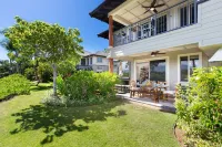 Sophisticated freshly remodeled two story Golf Villa w/Private Beach Club