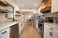 Luxury Home with Backyard Oasis near 12 min to Beach.