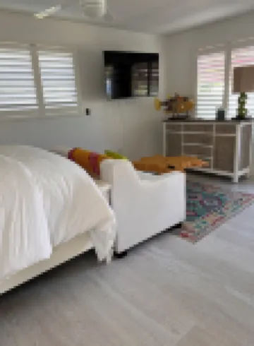 The Historic Coquina Cottages C is 2 Blocks to the Beach, 5th Avenue and 3rd St.