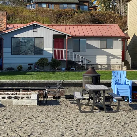Beach house with views of Puget Sound, ferry, North Cascades, Mt Baker, Rainier.