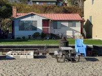 Beach house with views of Puget Sound, ferry, North Cascades, Mt Baker, Rainier.