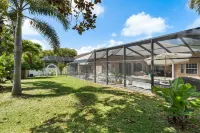 Dunedin Lux 5Br Villa w/Heated Saltwater Pool & Spa, Patio, Putting Green & BBQ Hotels near Honeymoon Island State Park