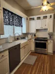 Enjoy small-town, Main Street from the front porch of this historic bungalow!