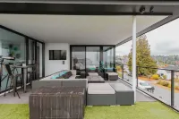 Stunning Lake and Mountain Views with Hot Tub - Modern Oasis Retreat