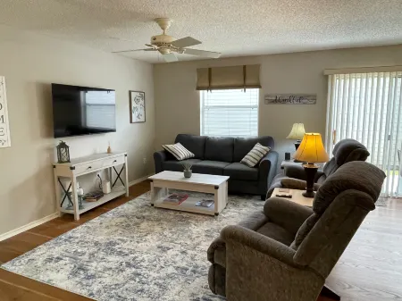 Charming Home with Enclosed Lanai and Golf Cart - Stylish Retreat