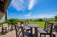 Stunning Views and Private Pool Access - Serene Oceanfront Oasis