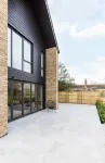 Stylish new home with parking - king beds garden