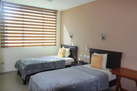 Hotel Flamingo Отели рядом с достопримечательностью «Исследовательская станция Чарльза Дарвина»