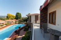 Country Inn Tarika Resort Jim Corbett - piscina