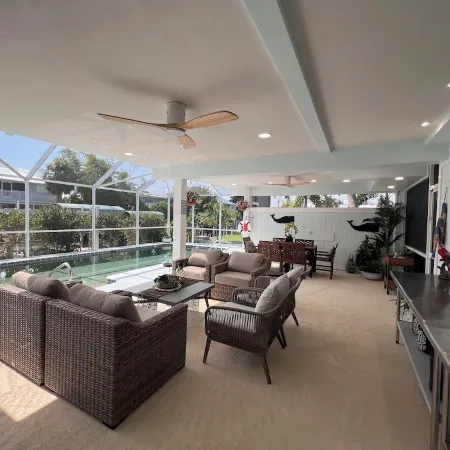 Antigua Cay Retreat is a stylish home with pool on deep water canal in Bokeelia