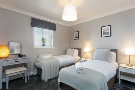 Harris Retreat - Donnini Apartments Отели рядом с достопримечательностью «Библиотека Форхилл Бранч»