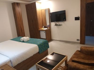 Deluxe Room Hotel De Pebbles Photo