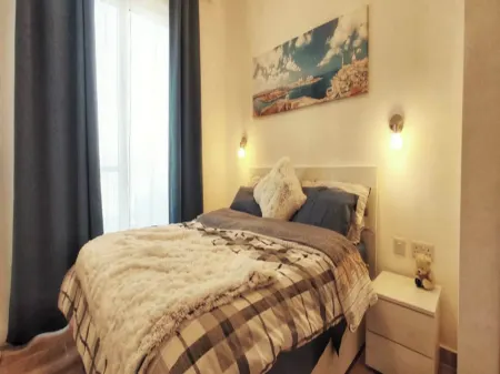 Modern 3 bedroom penthouse with Rooftop views Отели в г. Хамрун