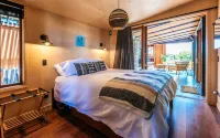 Designer living with stunning views across the bay, a spa and coast walks.