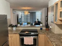 Your Cozy Combate beach retreat, 2 bed/2bath, full A/C, free laundry