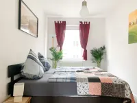 Entspannung Pur: Stadtnahe Ferienwohnung mit Grünem Rückzugsort im Garten