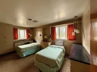 Cheerful 4-bedroom bungalow with indoor fireplace.