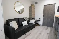 Lake Okanagan brand new beach condo with AC, heated outdoor pool, patio and BBQ.