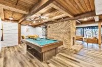Spacious A-Frame sleeps 25 on 5 wooded acres with a private fishing pond