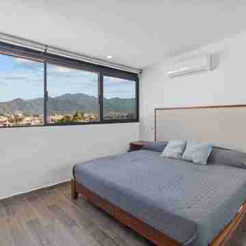 well located Apartment with pool and private Terrace, overlooking The city. Rooms