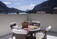 Penthouse with lake and mountain views in Molveno Hotels in Molveno