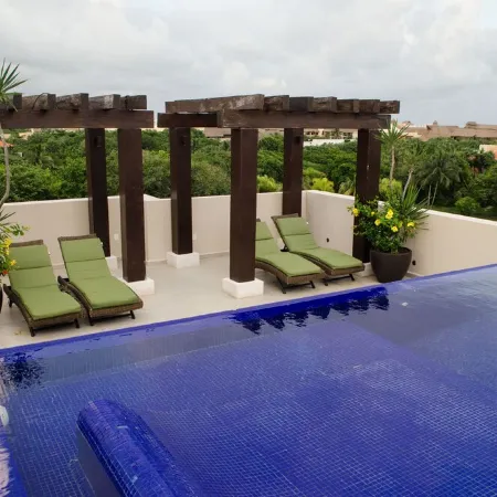Charming 2-bedroom condo with WiFi, AC in wonderful Puerto Aventuras