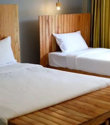 ห้องเตียงแฝดพร้อมทางสู่สระว่ายน้ำ