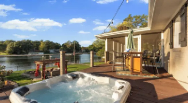 Dock, Hot Tub & Kayaks on Lake Norman Lakeside Gem by Avantstay