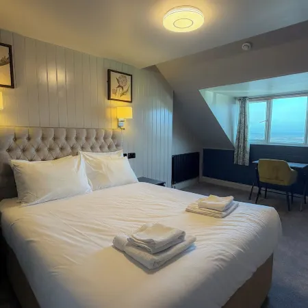 Nomi Rooms & Restaurant Отели рядом с достопримечательностью «Замок Долбадарн»