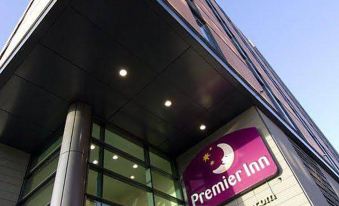 "a modern building with a large glass door , featuring the sign "" premier inn "" on the entrance" at Premier Inn Sheffield City Centre (St Mary's Gate)