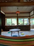 It is a Farmhouse Inn Located in a Satoyama Surrou Hotels in Hiranai