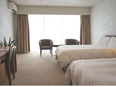 メインビルの高層階、バス付きツイン、オーシャンビュー EMウェルネス 暮らしの発酵ライフスタイルリゾートの写真