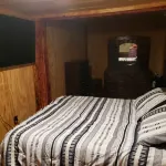 This secluded cabin is tucked away in the mountains. With a handicap access ramp