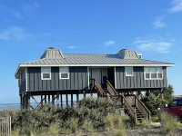 Affordable Beach Front Living that is Dog Friendly.  Classic Beach House