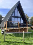 Stunning Scandinavian A Frame lodge with outside bathtub