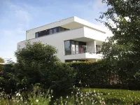 Modern apartment with stunning views of the water and the Rügen Bridge - Homestays