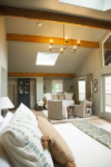 private hot tub, fun game room, cozy beach house