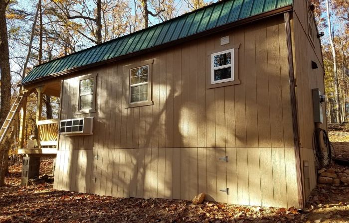 Pet friendly cottage on 17 acre Lake front property with dock and kayak access