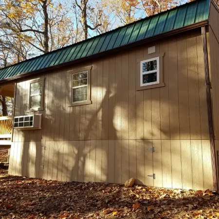 Pet friendly cottage on 17 acre Lake front property with dock and kayak access