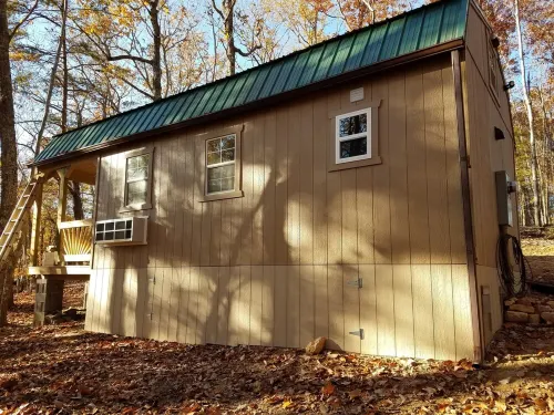 Pet friendly cottage on 17 acre Lake front property with dock and kayak access