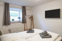 Modern vacation apartment directly on the Schloßsee, with its own terrace Hotels in Glucksburg