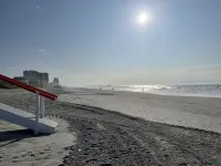 Listen to ocean waves from this beautifully updated condo with a lake view!