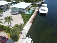Coconut Sunsets Open Water Views, Ice, Pool, Spa 100 ft dockage, Putting Green