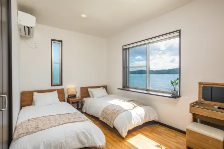 Isola Villa Amami Отели в г. Тацуго