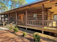 1850 log cabin with 2 br, 2 baths, W/D, mini split A/C, carport attached