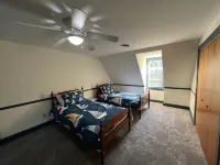 Escape with family or friends to this peaceful, 4-bedroom retreat on the water