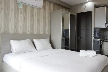Cozy Studio Apartment at Mekarwangi Square Cibaduyut Отели рядом с достопримечательностью «Jalan Pasar Induk Caringin»