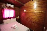 Macoco Resort Hotels in Belas